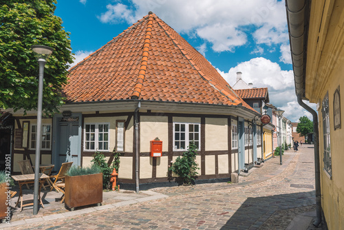 Canvastavla Beautiful old traditional houses in Odense old town, Denmark, Europe with post b
