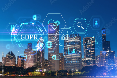 Chicago skyline from Butler Field to financial district skyscrapers, night time, Illinois, USA. Parks and gardens. GDPR hologram, concept of data protection regulation and privacy for individuals