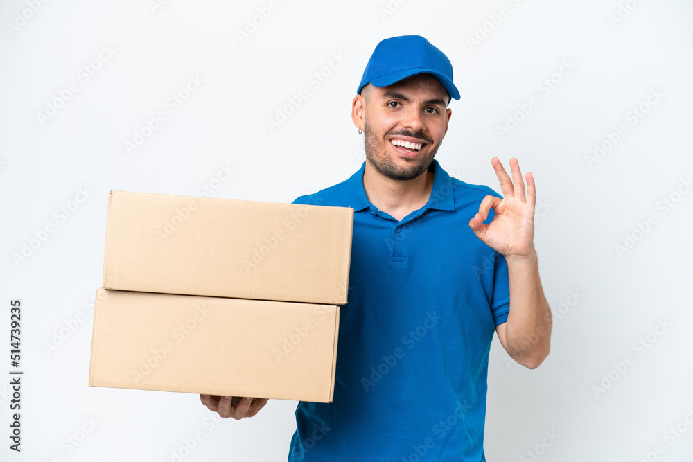 Delivery caucasian man isolated on white background showing ok sign with fingers Delivery caucasian man isolated on white background showing ok sign with fingers