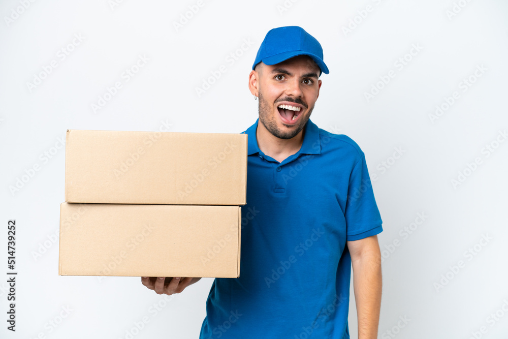 Delivery caucasian man isolated on white background with surprise facial expression Delivery caucasian man isolated on white background with surprise facial expression