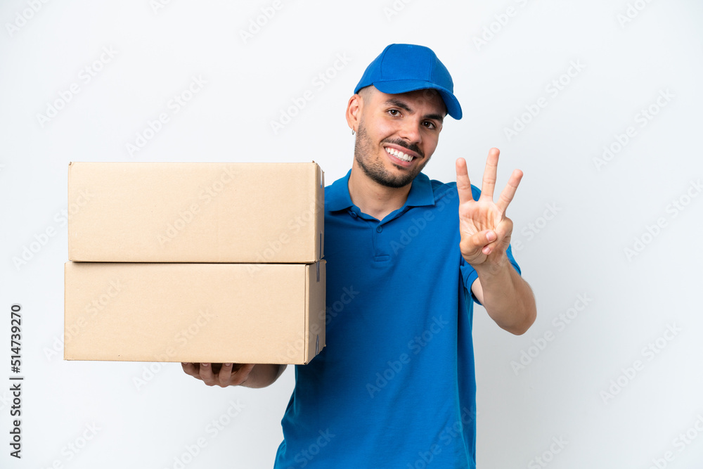 Delivery caucasian man isolated on white background happy and counting three with fingers Delivery caucasian man isolated on white background happy and counting three with fingers