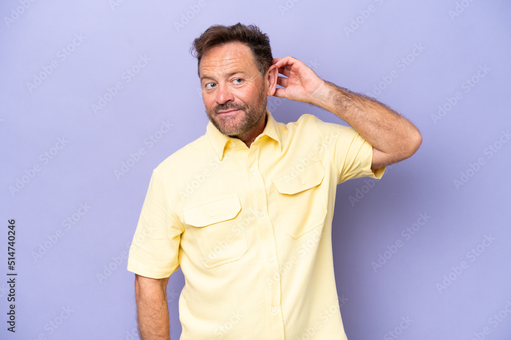 Middle age caucasian man isolated on purple background having doubts Middle age caucasian man isolated on purple background having doubts