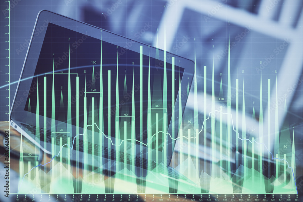 Forex market chart hologram and personal computer background. Double exposure. Concept of investment. Forex market chart hologram and personal computer background. Double exposure. Concept of investment.