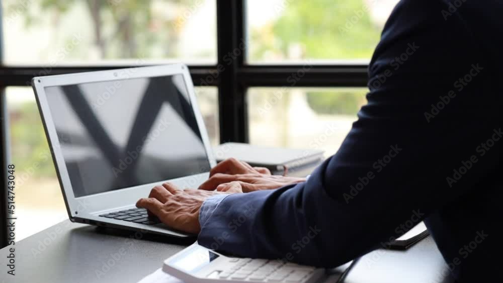 Person sitting in office with papers and laptop, businessman checking company financial and accounting summary, office work, corporate management to grow and progress. working in a company office. Person sitting in office with papers and laptop, businessman checking company financial and accounting summary, office work, corporate management to grow and progress. working in a company office.