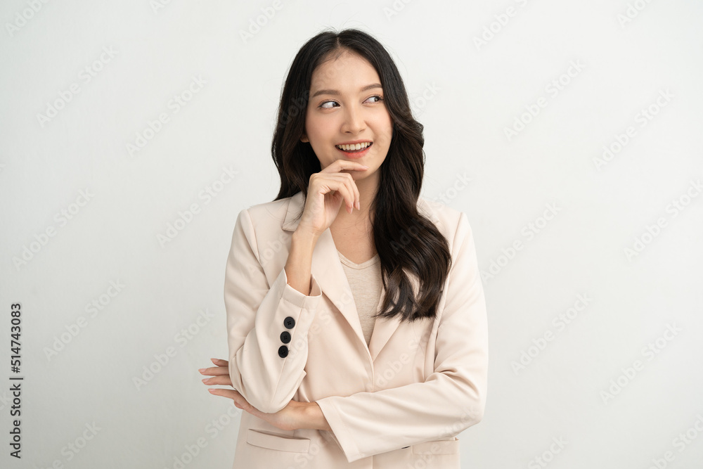 Cute asian woman in color casual dress thinking and imagination isolated on pink background Cute asian woman in color casual dress thinking and imagination isolated on pink background