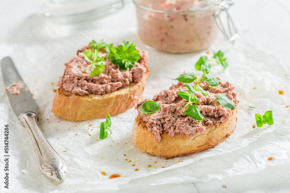 Crisp and hot bruschetta with fegatini and parsley for breakfast.