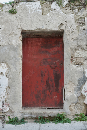 Old  picturesque main front door in mediterranean region house