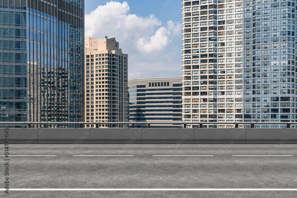 Empty urban asphalt road exterior with city buildings background. New modern highway concrete construction. Concept of way to success. Transportation logistic industry fast delivery. Chicago. USA.