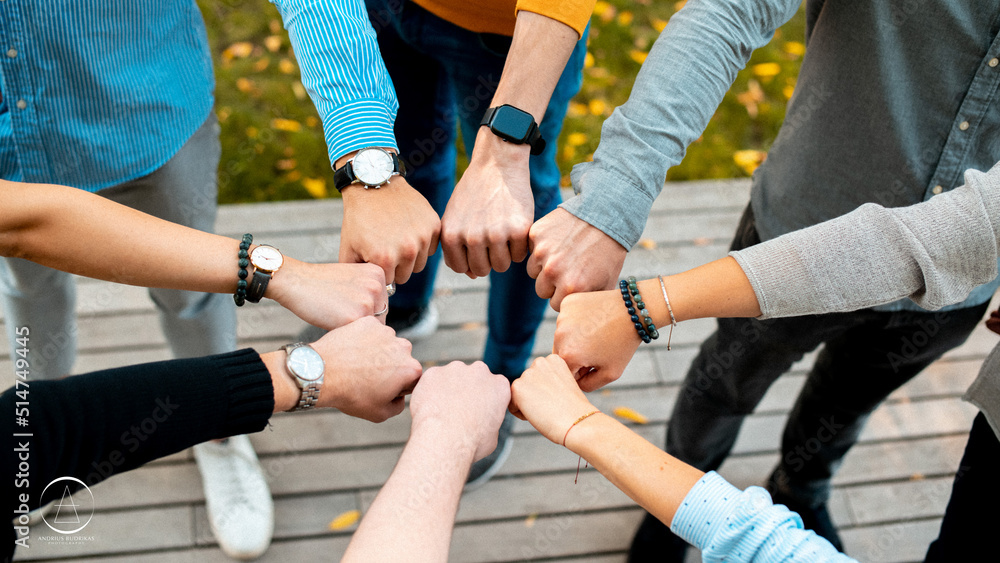 group of people holding hands together Stock Photo Adobe Stock