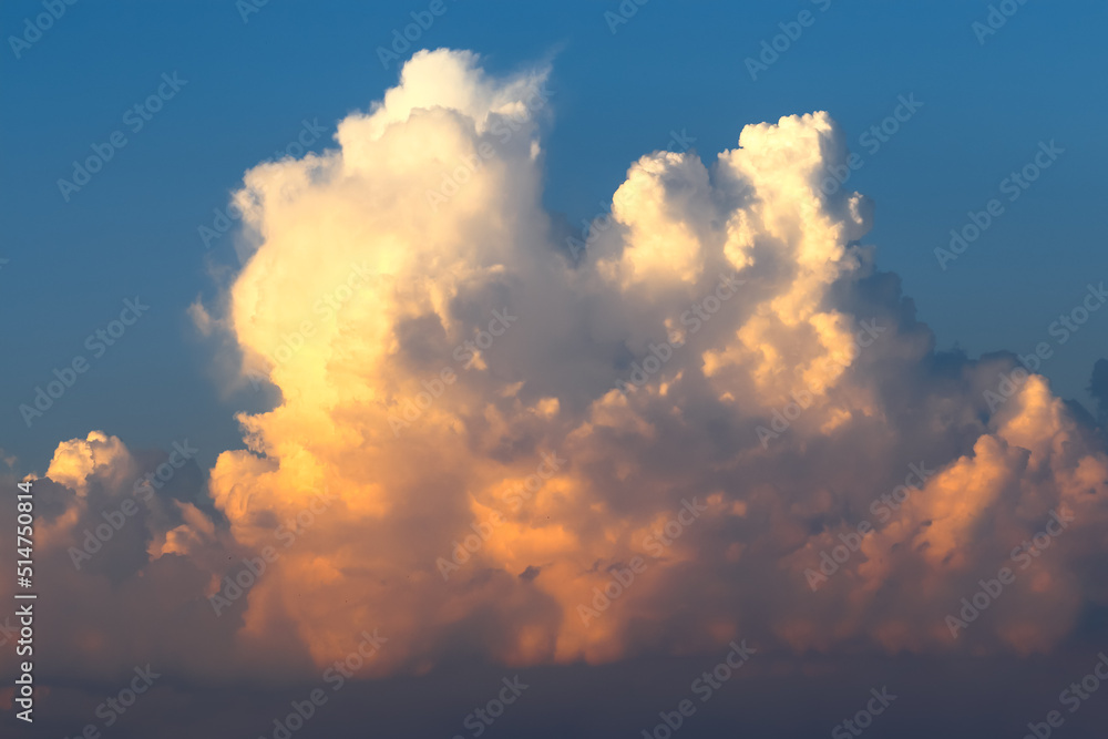 Cumulonimbus large beautiful cloud in the evening, sunset