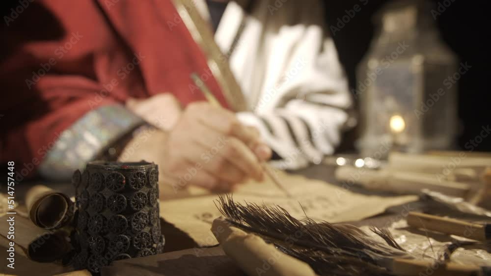 Letter in the Middle Ages.
Writing historical letter by candlelight. Communication by Letter in History.
Letter in the Middle Ages.
Writing historical letter by candlelight. Communication by Letter in History.