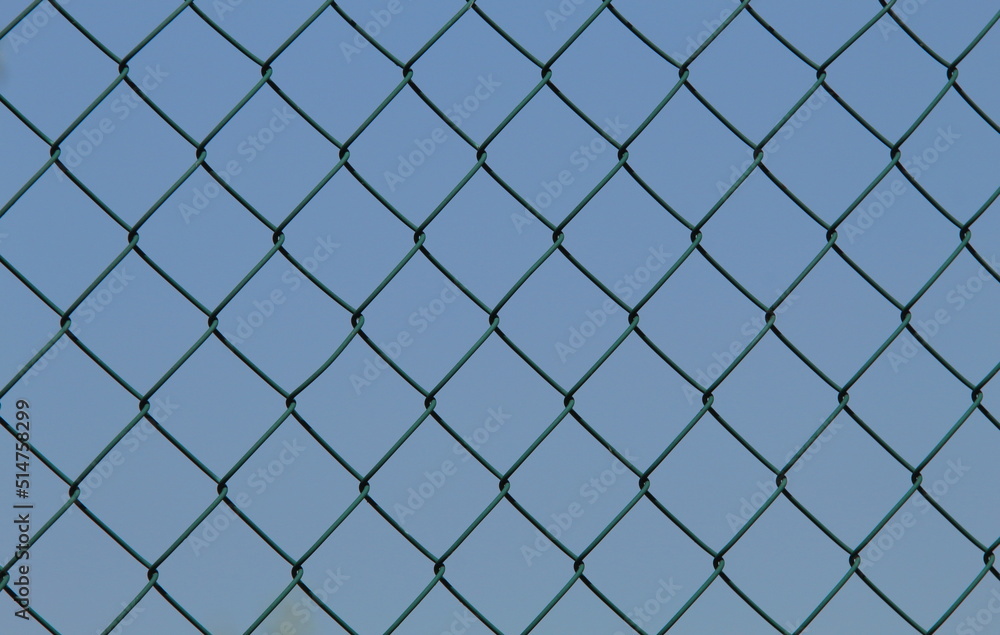 chain link fence with blue sky chain link fence with blue sky