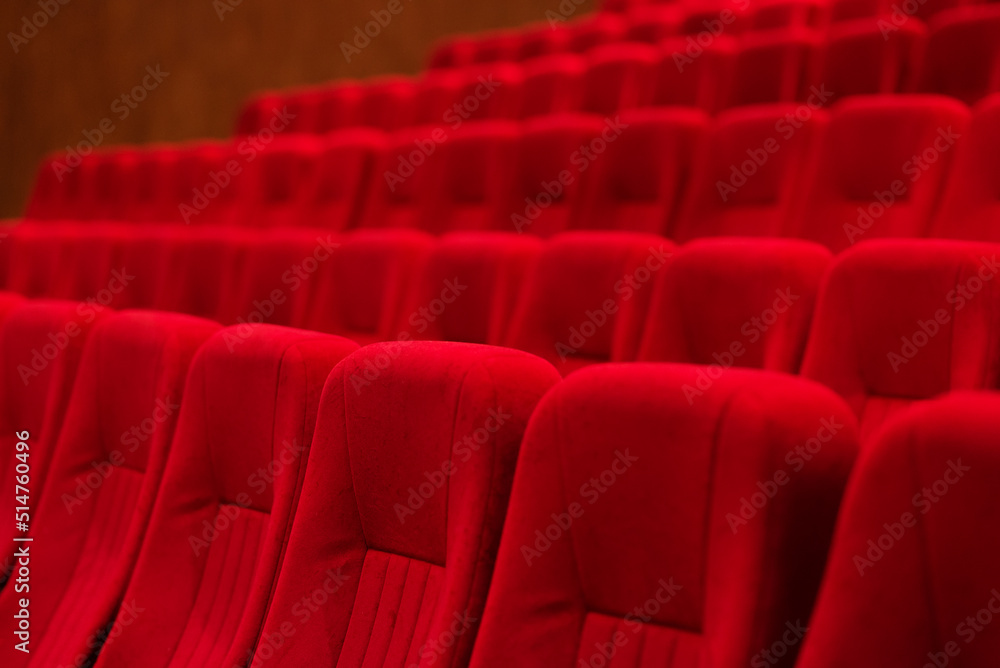 Obraz premium Empty cinema hall with red seats. Movie theatre