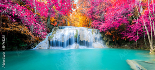 Fototapeta Naklejka Na Ścianę i Meble -  Amazing in nature, beautiful waterfall at colorful autumn forest in fall season	
