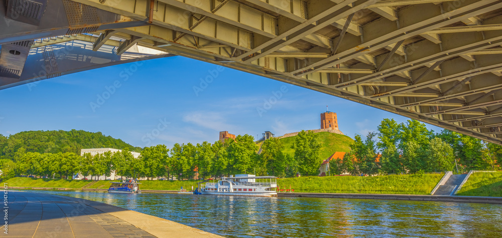 Fototapeta premium Sunny landscape of Vilnius, capital of Lithuania, summer day at Vilnius, view under the bridge