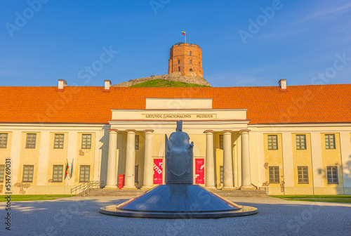 Vilnius, Lithuania - June 27, 2022: Monument to Grand Duke Gediminas with National Museum of Lithuania and Gediminas castle photo