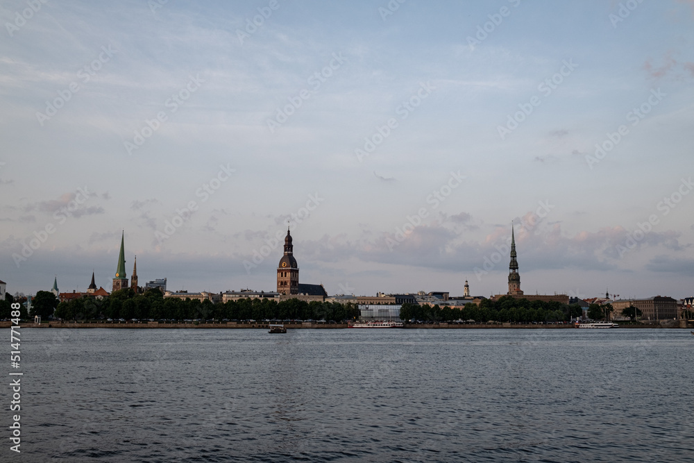 Obraz na płótnie River Daugava flows through Latvia capital Riga. Riga cityscape  w salonie