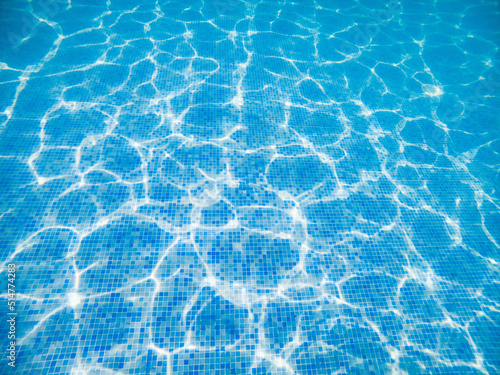 clear blue water texture in swimming pool © Melinda Nagy