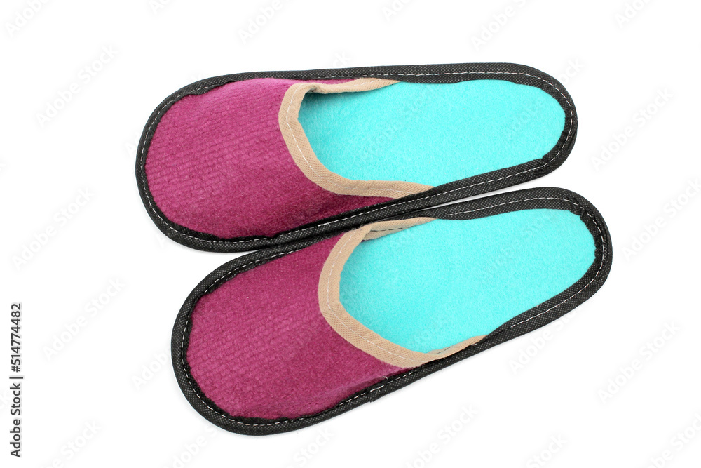 Burgundy textile slippers with turquoise insole, house slippers isolated on white background, home clothes, top view Burgundy textile slippers with turquoise insole, house slippers isolated on white background, home clothes, top view
