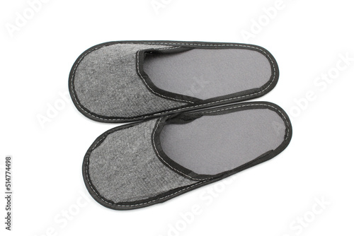 Gray textile slippers with gray insole, house slippers isolated on white background, home clothes, top view