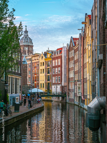 Canvas Print Amsterdam with river and houses in the city