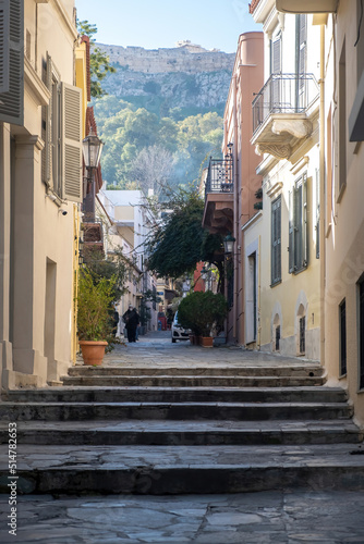 Greece. Plaka, old house, narrow stair and alley. Under view of Acropolis of Athens rock. Vertical © Rawf8