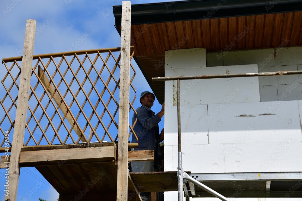 Energy saving by insulating the roof house with white polystyrene Energy saving by insulating the roof house with white polystyrene
