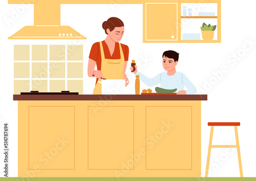Mom teaching son cooking food. Family spending time together