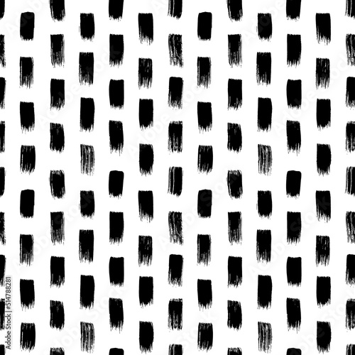 Short hand drawn strokes vector seamless pattern. Texture in hipster style with vertical black brush strokes. Abstract monochrome grunge style background. Black paint dry bold short lines. 