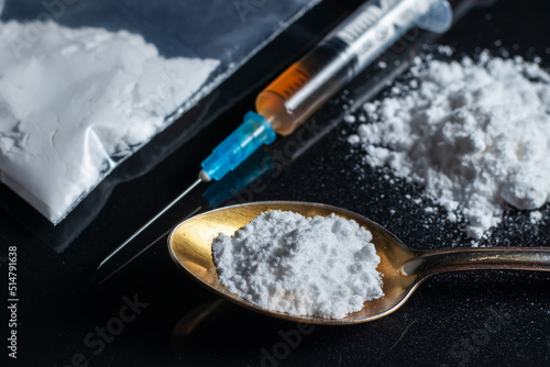 фотографія Concept drug addiction. Drugs on a black background.