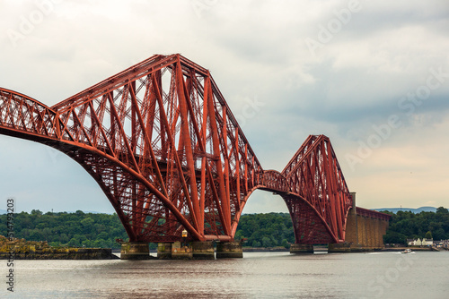 The Forth Bridge is a cantilever railway bridge across the Firth of Forth in the east of Scotland, 9 miles (14 kilometres) west of central Edinburgh.