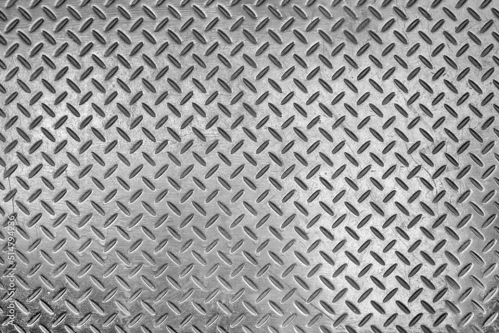 Metallic background with texture detail of a slip metal floor Metallic background with texture detail of a slip metal floor