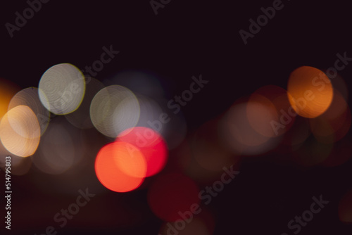 Blurred bokeh of light and illumination for abstract background. © Kenstocker