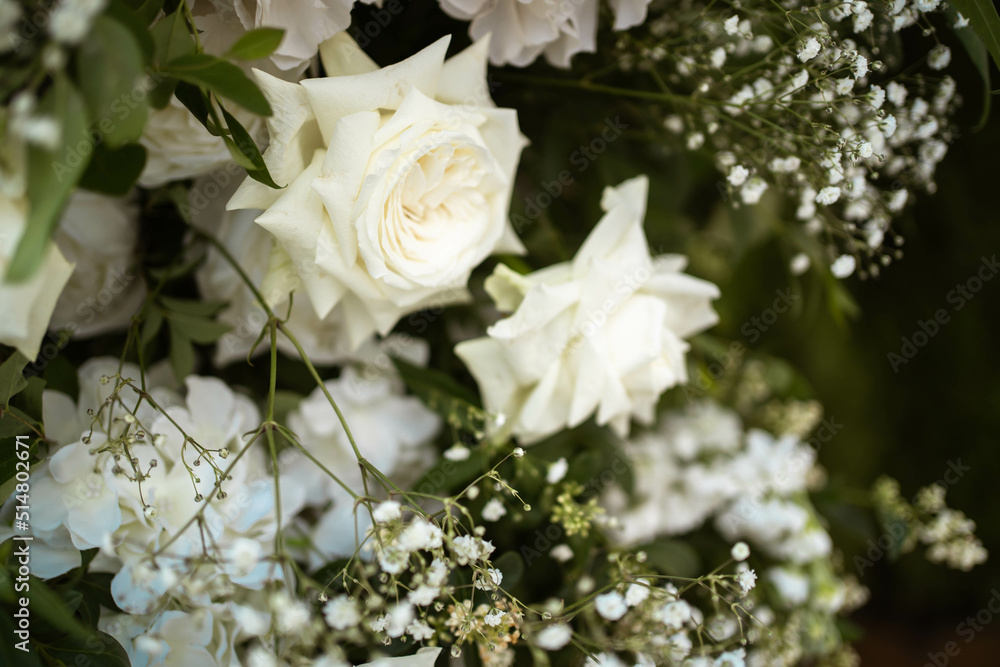 Fototapeta premium Close up of wedding decorations, with white fresh flowers. Tender wedding arrangements.