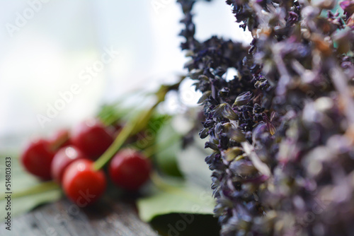 Fresh red cherries fruit on wooden background close up. High quality photo
