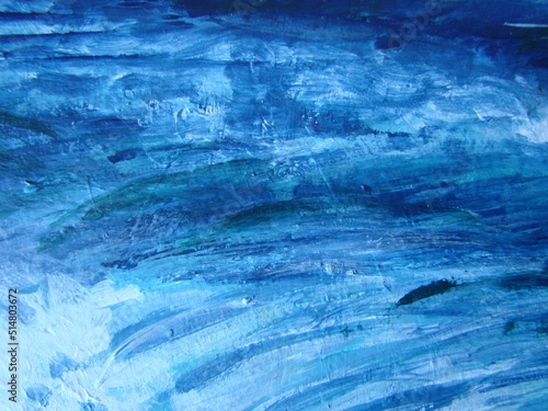 Close up detail of the brushwork in an abstract oil painting in blue, yellow, green and white showing the texture of the painting on canvas.