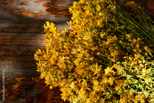 Wild flowers on wooden background close up. High quality photo