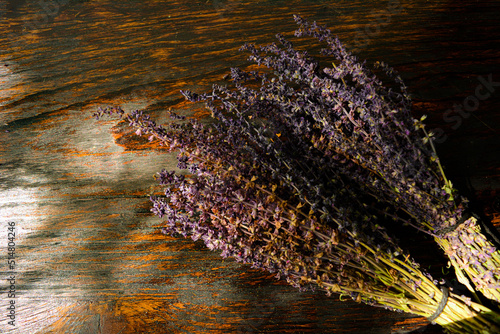 Wild flowers on wooden background close up. High quality photo