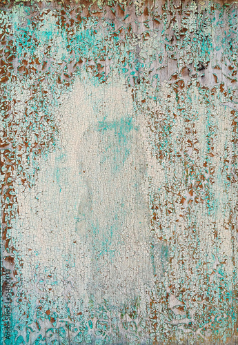 Peeling detailed beige and turquoise paint on wooden wall © Artem Popov