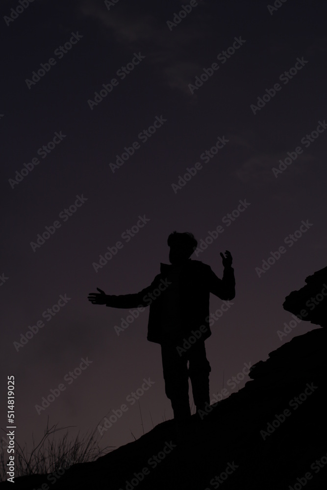Silhouette of a model from the hill station on evening time Silhouette of a model from the hill station on evening time
