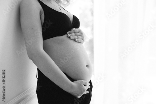woman holding belly