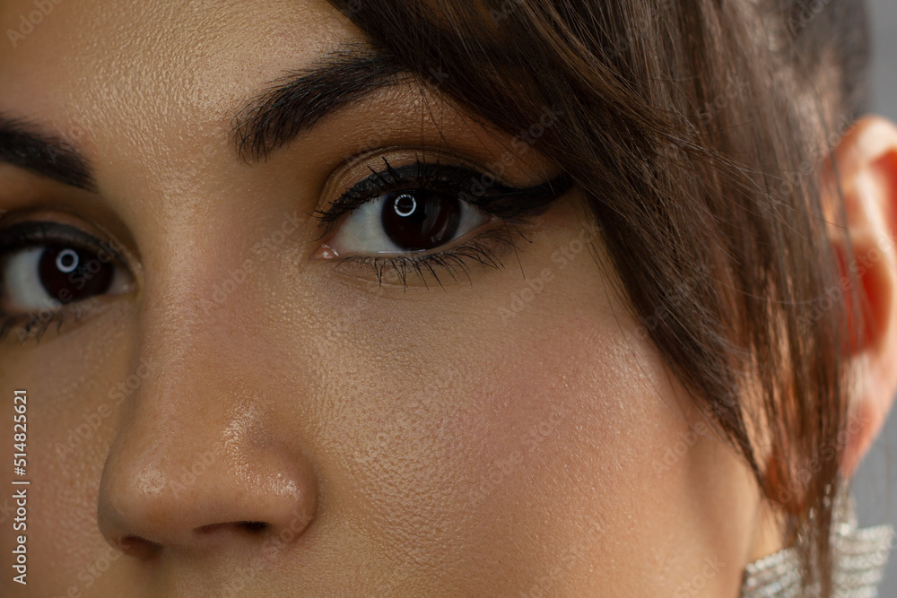 Beautiful macro of expressive brown eyes with fashionable pink smoky shadows, extremely long eyelashes. Cosmetology, eyebrow correction, eyelash extensions, makeup, cosmetics, eyesight, contact lenses Beautiful macro of expressive brown eyes with fashionable pink smoky shadows, extremely long eyelashes. Cosmetology, eyebrow correction, eyelash extensions, makeup, cosmetics, eyesight, contact lenses