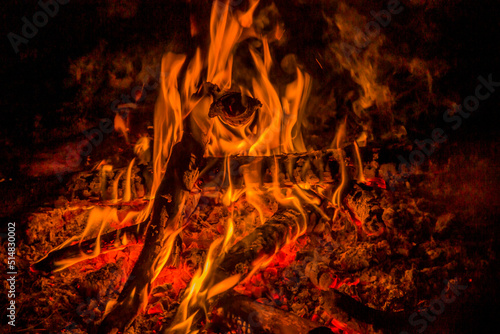 a campfire at the dark