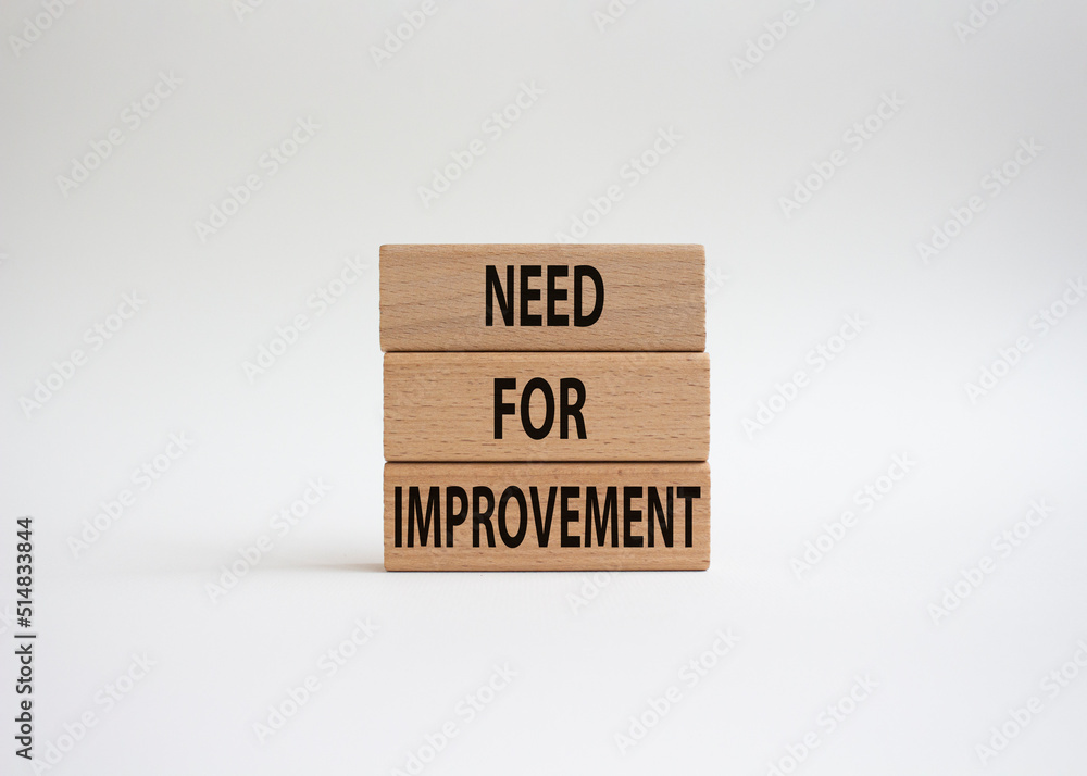 Need for Improvement symbol. Wooden blocks with words Need for Improvement. Beautiful white background. Business and Need for Improvement concept. Copy space. Need for Improvement symbol. Wooden blocks with words Need for Improvement. Beautiful white background. Business and Need for Improvement concept. Copy space.