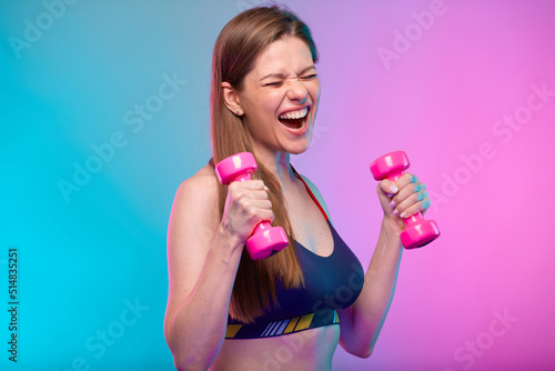 Fényképezés more power with sporty woman doing exercise with dumbbells