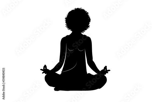 silhouette of a person meditating