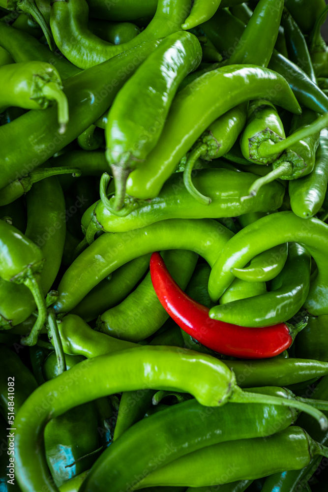 Raw Green Organic Serrano Peppers. green chili peppers Raw Green Organic Serrano Peppers. green chili peppers