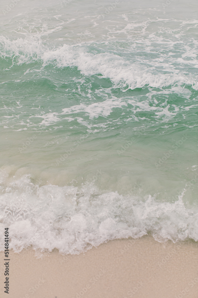 Teal colored waves crashing up on the foggy misty Pensacola Florida beach. Teal colored waves crashing up on the foggy misty Pensacola Florida beach.