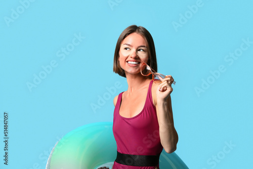 Happy young woman with sun ...