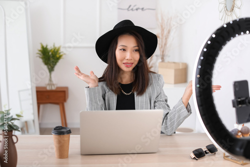 Female Asian blogger record...